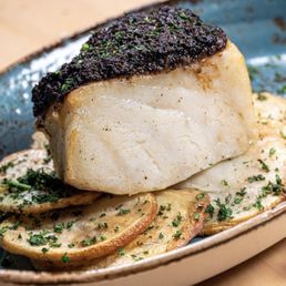 Joe’s Stone Crab signature dishes Joe’s Stone Crab 
Chilean Sea Bass
NY Strip